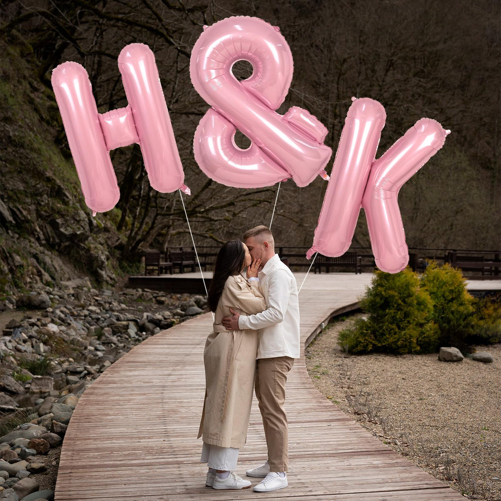 Biapian name-abbreviation balloon in pink suits birthdays and baby showers.