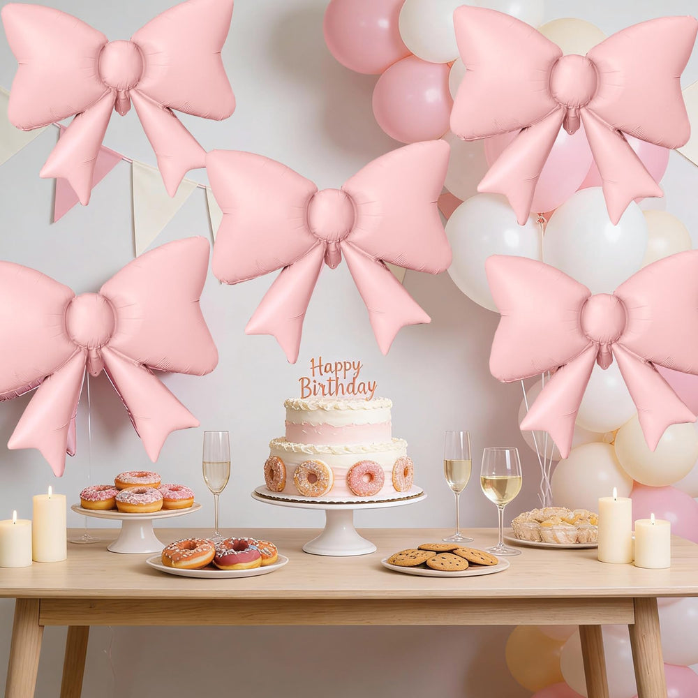 Biapian pink bow balloon with ribbon included for easy setup.