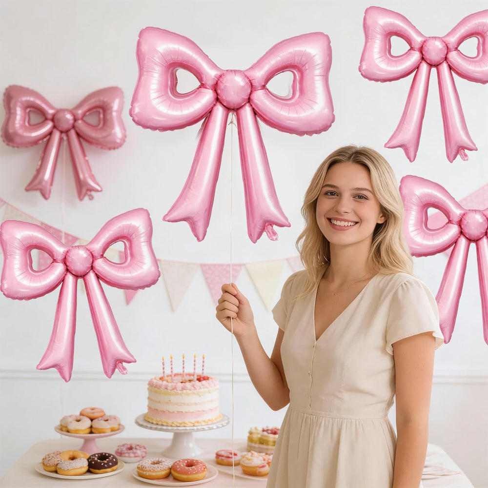 Biapian pink bow foil balloon with ribbon suitable for hanging decorations.
