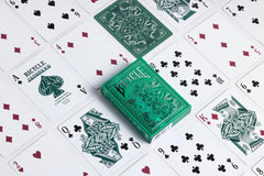 Card backs of Bicycle Jacquard feature woven-inspired design in silver and green