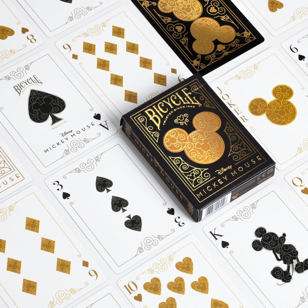 Hidden Mickeys pattern woven into card artwork for playful discovery during games.