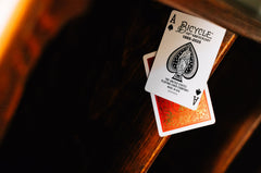 Bicycle poker night scene shows deck in action during a game.