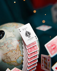 Kids learning Go Fish with Bicycle cards.