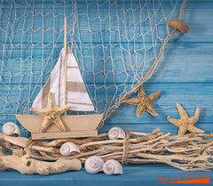 Big Mo's Toys fish net hanging decor enhances photo backdrops and party tables.