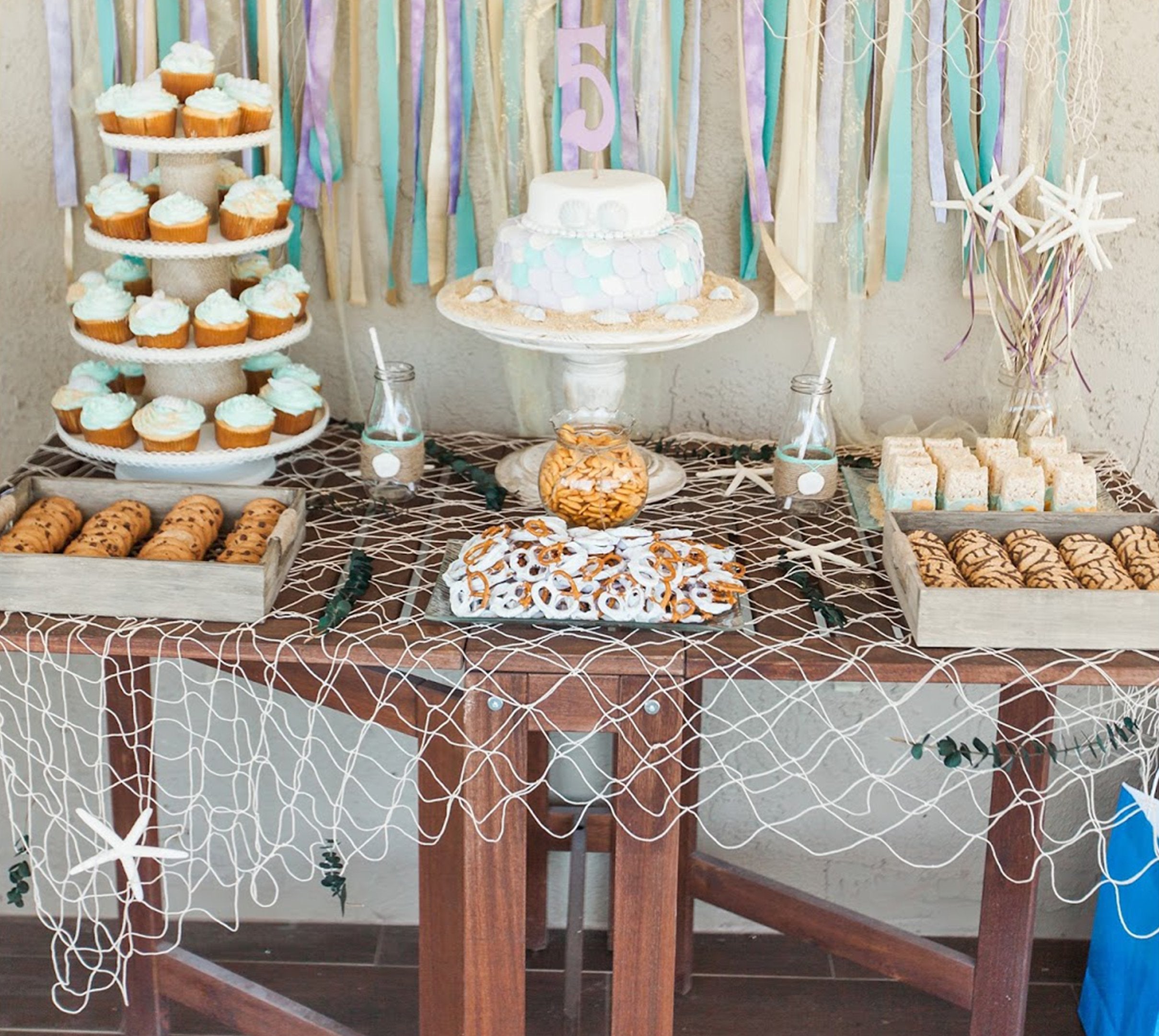 Big Mo's Toys cotton fish net enhances mermaid party aesthetics with breathable texture.