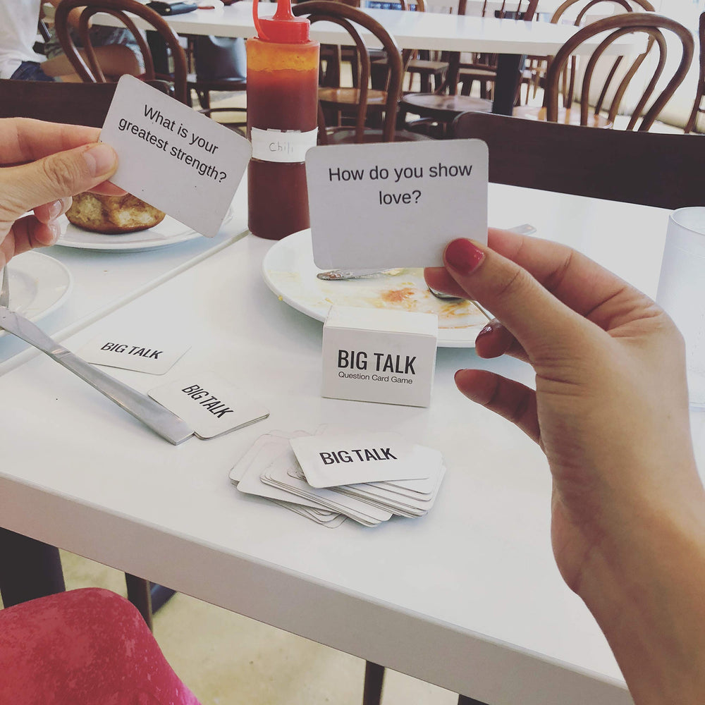 Big Talk Conversation Starters Date-night captures intimate questions sparking connection.