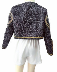 Binbo Rumi golden costume shorts close-up with gold chain waistband for stylish play