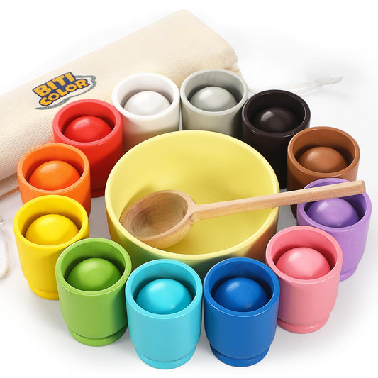 Biticolor ball-in-cup wooden rainbow set promotes color sorting and fine motor skills.