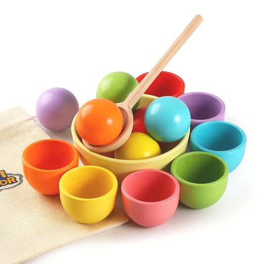 Biticolor Montessori ball and cup color sorting in wood for toddlers' learning.
