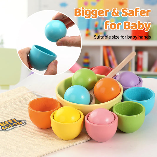 Biticolor rainbow wooden balls ready for color matching play and discovery.