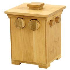 Bits and Pieces wooden puzzle box with bamboo tower cover, a clever unlock challenge for desks