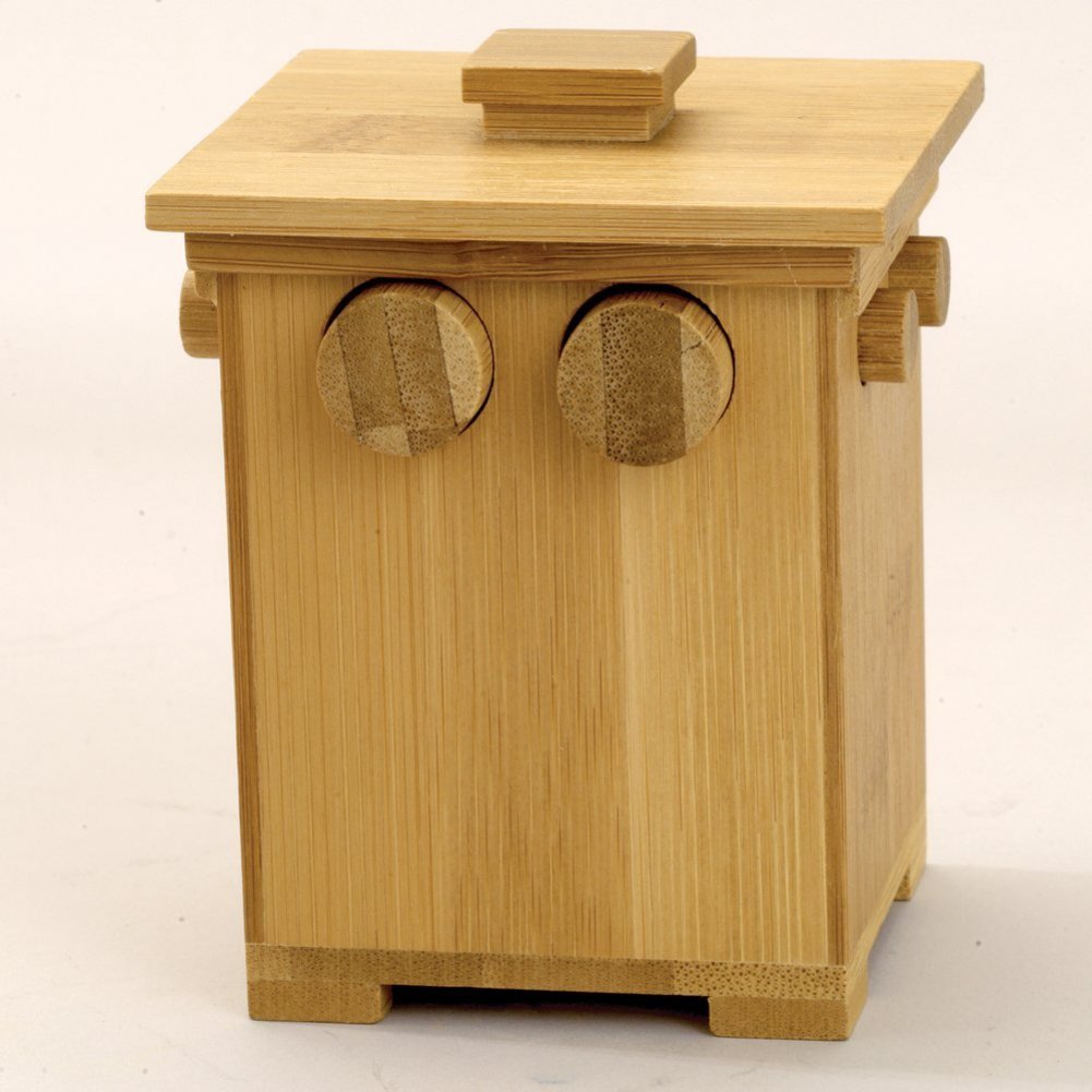 Bits and Pieces bamboo tower mechanism challenges you to move pegs strategically