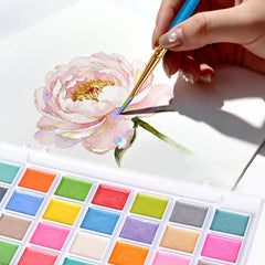 Blablaovy vibrant metallic paints create shimmering effects in artwork.