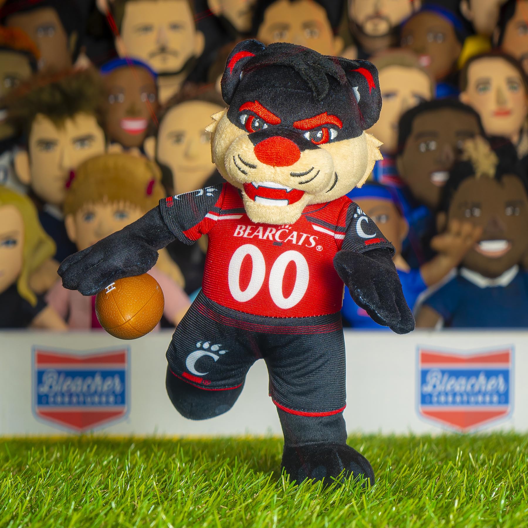 Bleacher Creatures Cincinnati Bearcats plush highlights team colors for display.