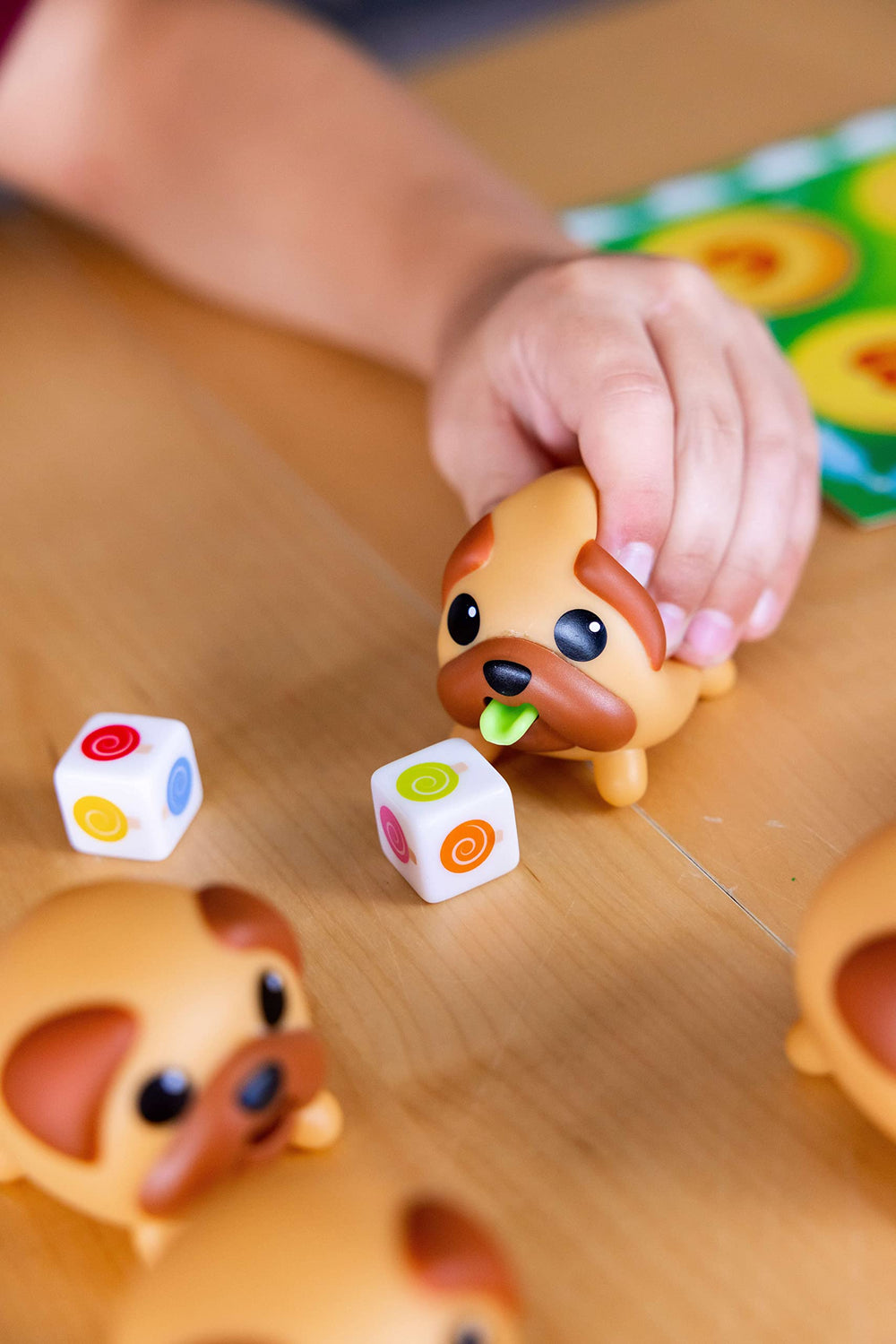Blue Orange Tongues Out! squishy pugs invite tactile play and fine motor engagement.