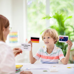 Blue Panda 205 Flags flash card back displaying capitals and continents.