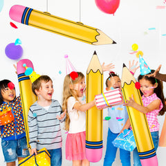 Blueweenly 27-inch inflatable pencils used as a colorful first-day photo prop