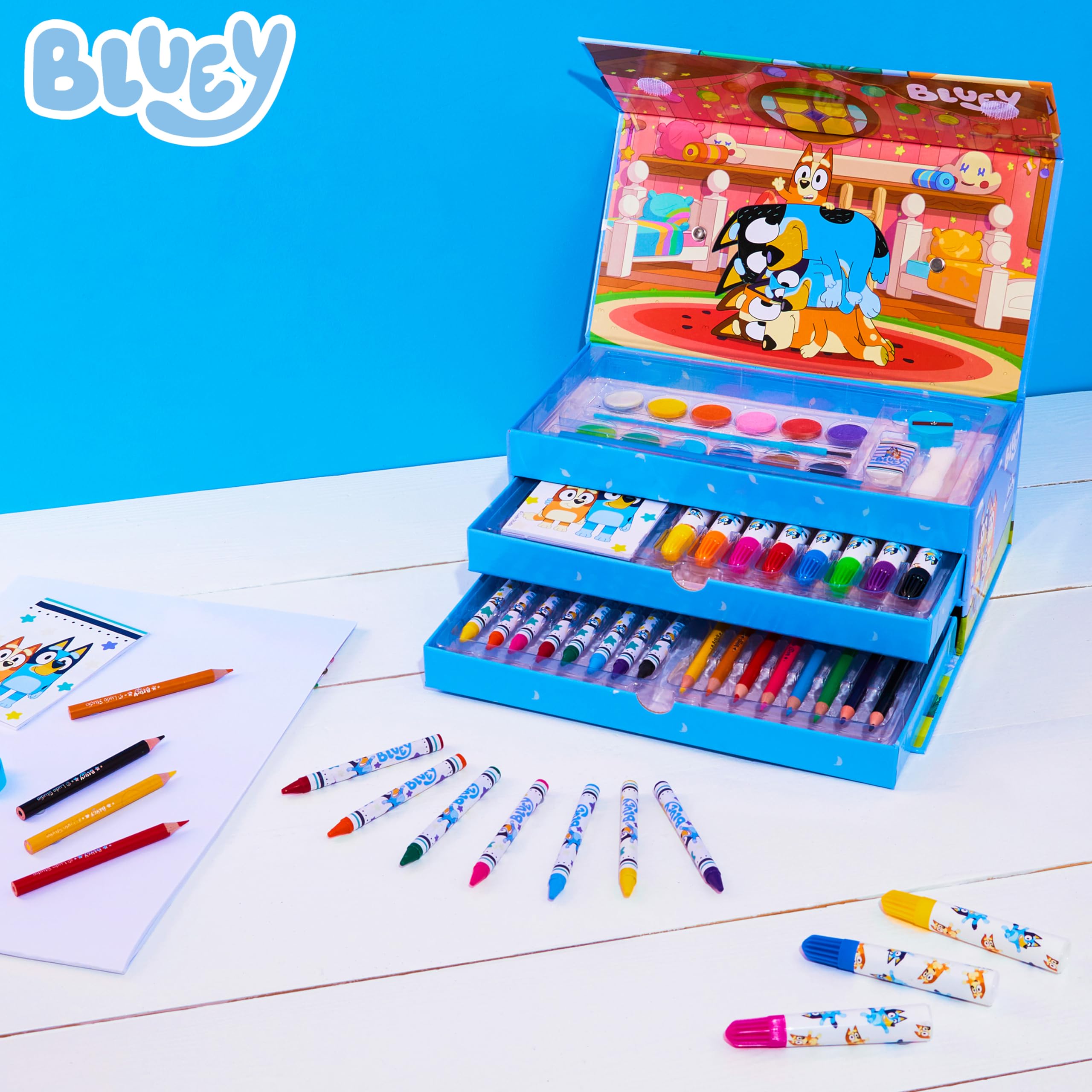Bluey pencils, crayons, and markers neatly organized for quick art sessions.
