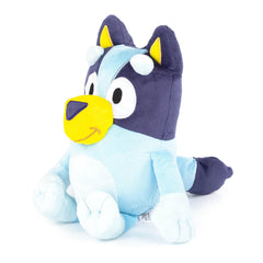 Bluey pillow buddy in bed at night, ready for nap time.