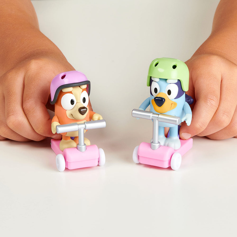 Scooter decks include pegs for secure figure placement.