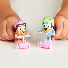 Scooter decks include pegs for secure figure placement.