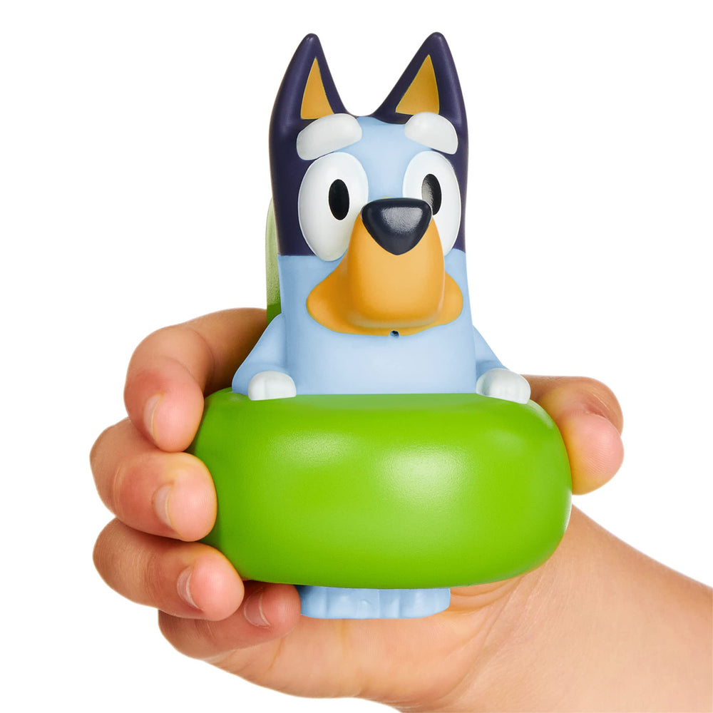 Bluey squeezable bath toy filled with water and squirt action