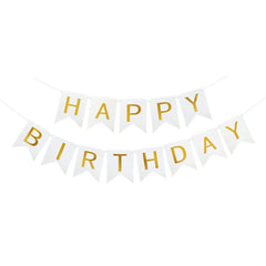 Blukey Happy Birthday banner with gold letters creates a chic photo backdrop.