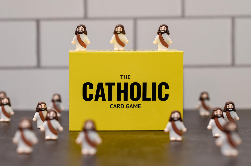 Board Catholic Friends enjoying game night with The Catholic Card Game and smiles.
