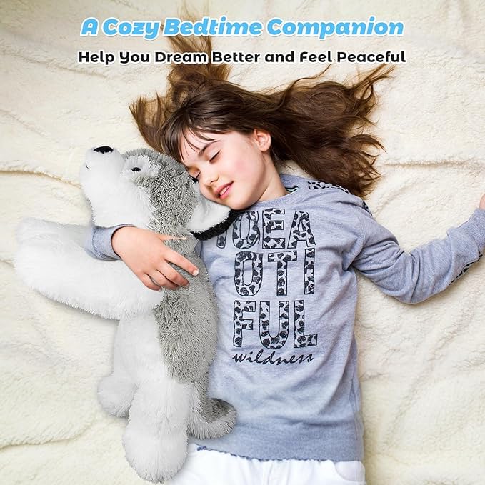 Bobbie & Laxi husky on bed setting, showing cozy comfort for nighttime companions.