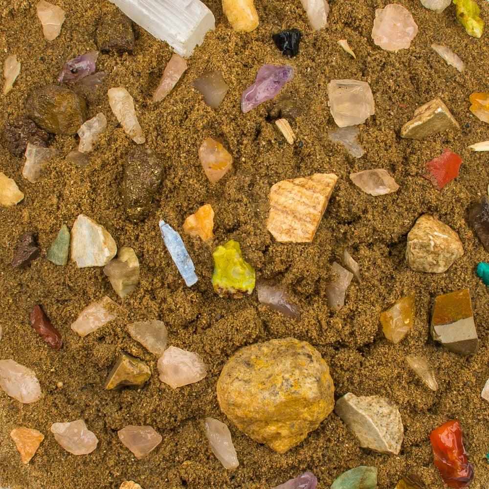 Boone's Mill gem mining rough stones in paydirt close-up.