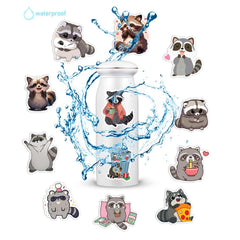 Booppyy raccoon stickers on a scrapbook for creative projects