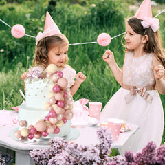 BOUBONI multi-size ball toppers help craft layered cake arrangements