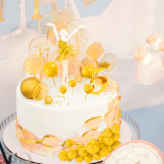 BOUBONI yellow ball toppers brighten cakes and desserts.