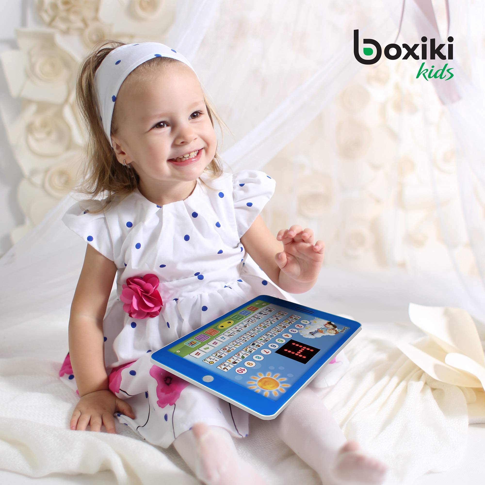 Boxiki Kids tablet LCD screen shows letters and graphics for visual learning