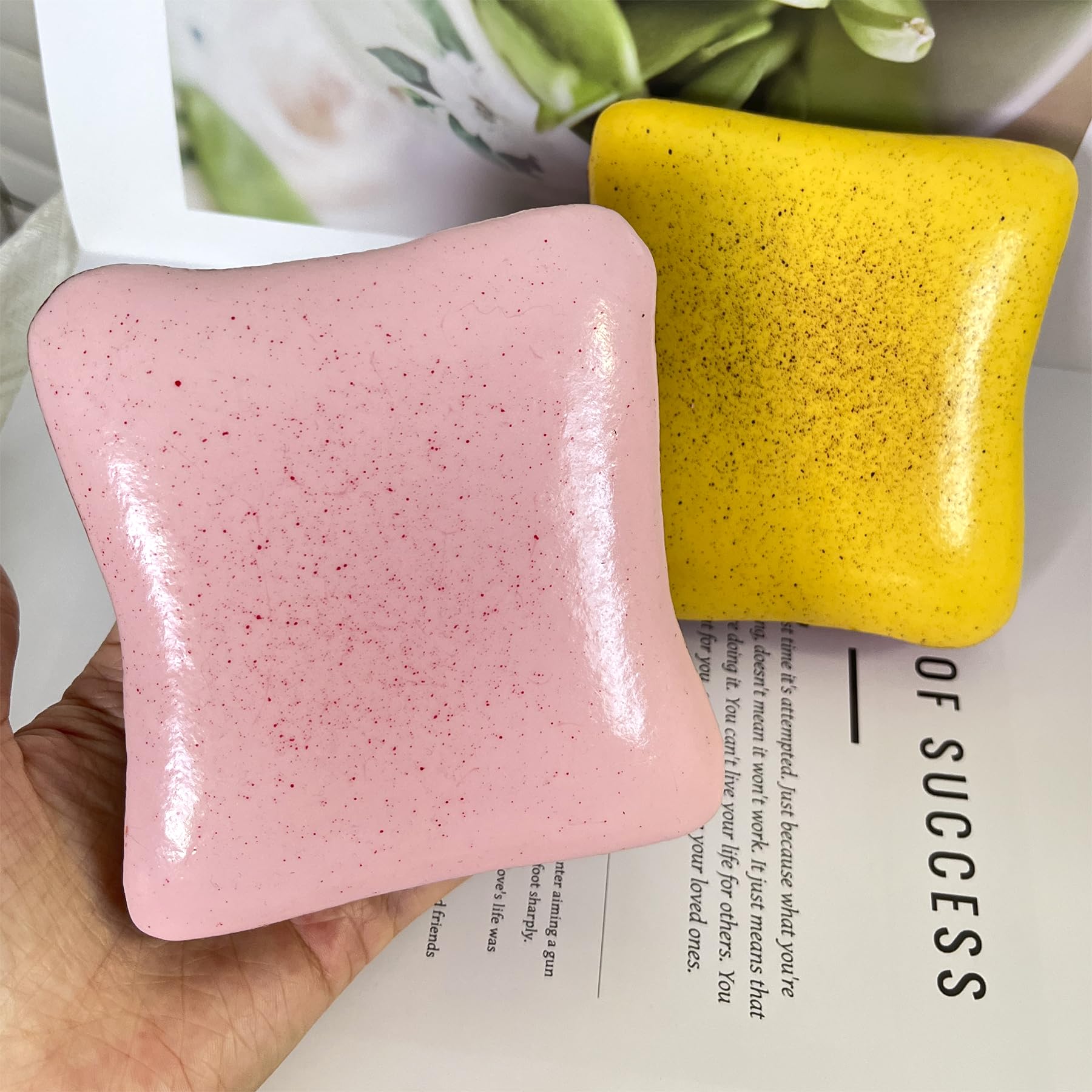 Bread Butter Squishy yellow in hand for tactile stress relief and focus.