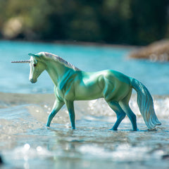 Breyer hand-painted details capture depth and color for collectible accuracy.