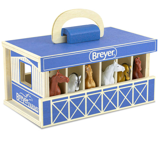 Breyer Horses Farms stable playset with wooden carry case for travel-friendly fun.