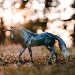 Breyer 1:12 scale model offers realistic size for display and storytelling.