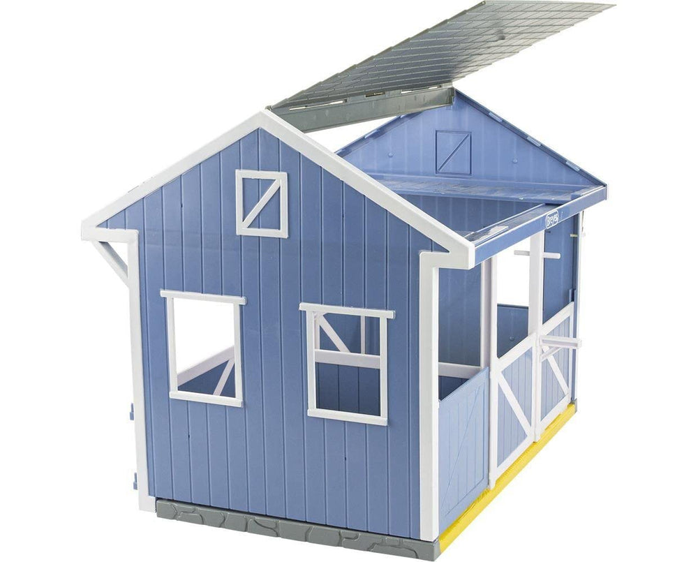 Stable roof opened on both sides for easy access to stalls and loft