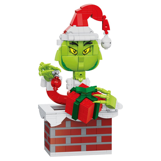 BrickCraft Grinch hanging from the chimney creates a dynamic holiday scene.