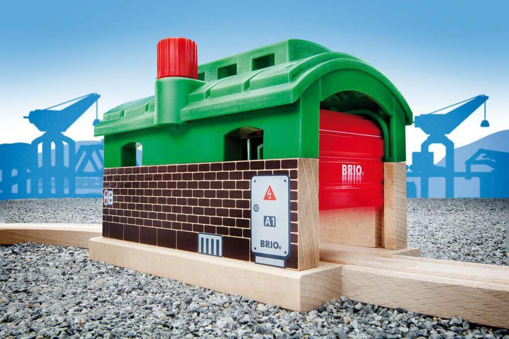 Brio Train Garage used as a tunnel with the track passing through.