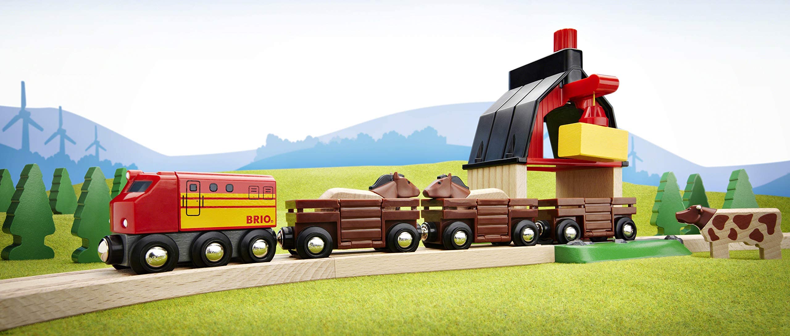 BRIO World Farm Railway Set magnetic hay crane lifting a bale in the barn yard
