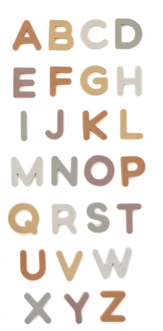 Brooklyn Neutral alphabet magnets on fridge support early literacy through interactive play.