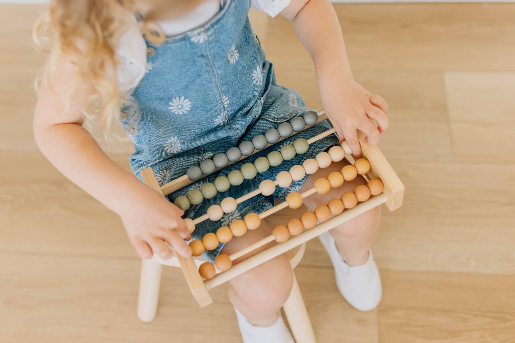 Brooklyn Neutral Boho Abacus playroom-decor shows modern math-themed decor for teaching moments