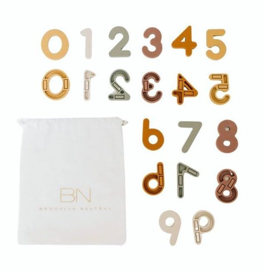 Brooklyn Neutral silicone magnetic numbers on fridge support early math learning and play.