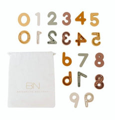 Brooklyn Neutral silicone magnetic numbers on fridge support early math learning and play.