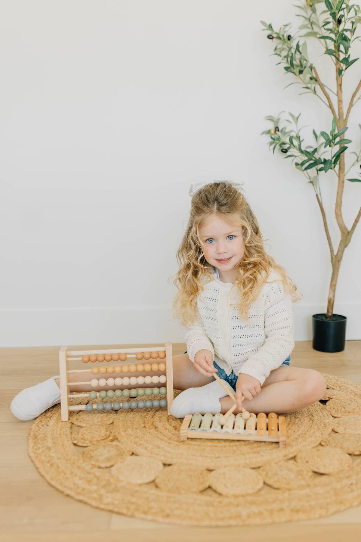 Brooklyn Neutral Xylophone neutral colors suit a boho nursery.