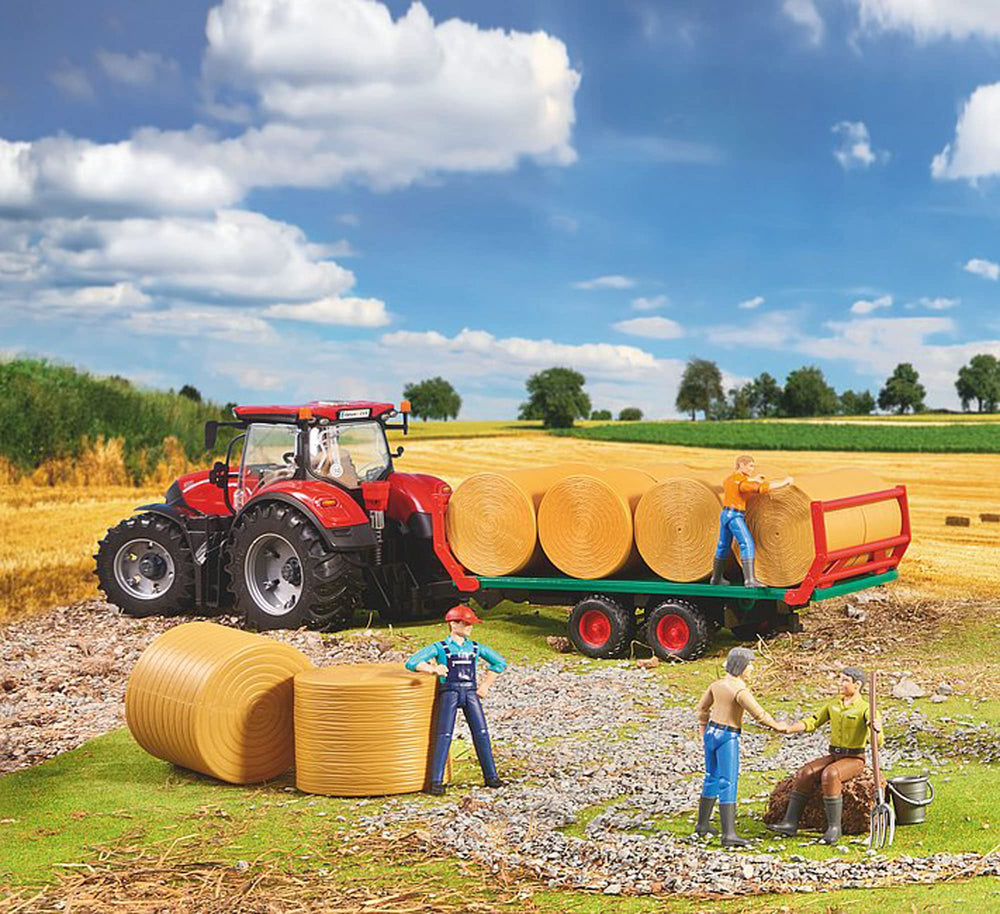 Sculpted tires on the Bruder Bale Transport Trailer for realistic outdoor action.