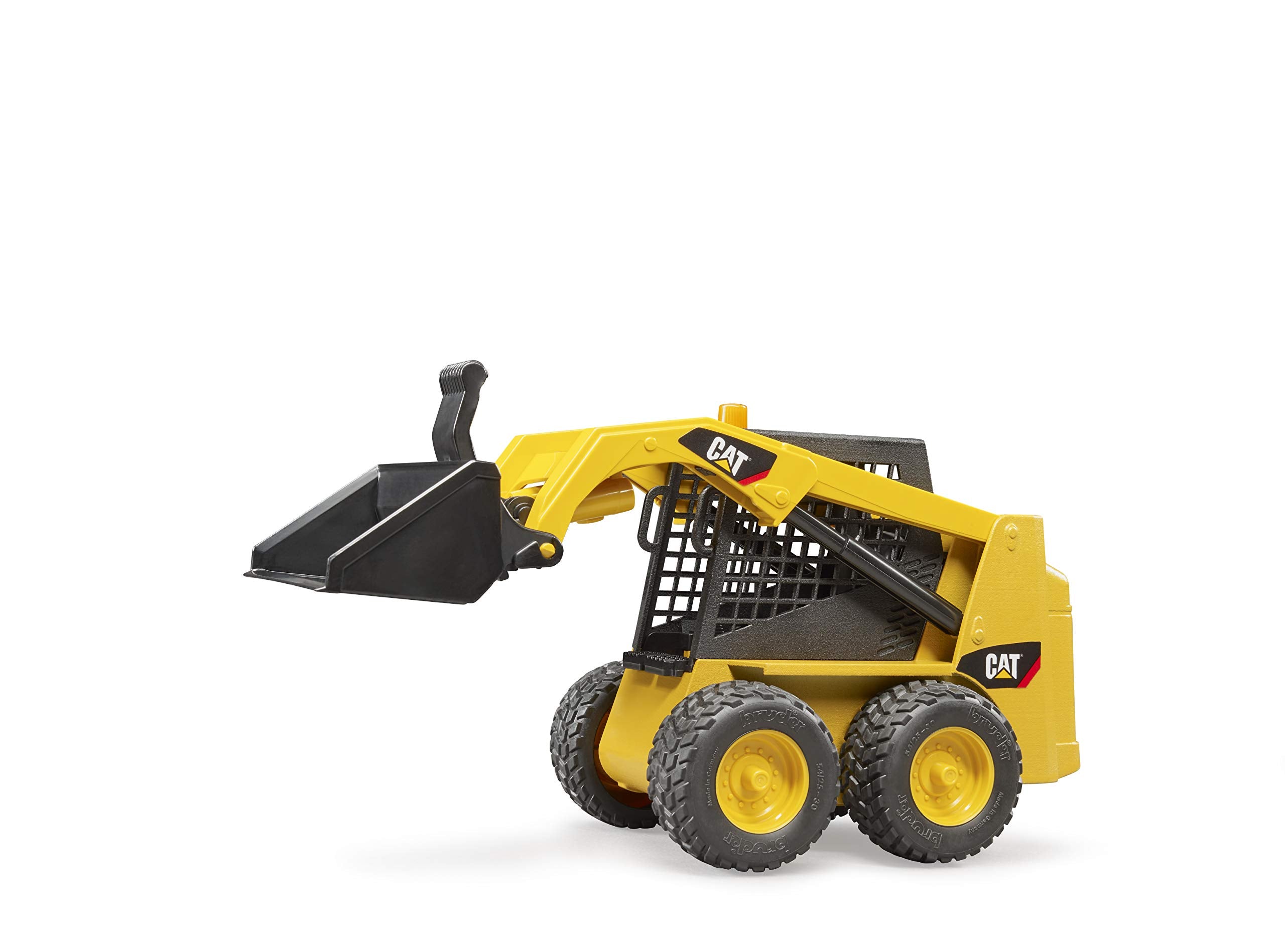 Bruder 02482 Caterpillar skid steer loader in action with rubber-like tread tires for indoor outdoor use