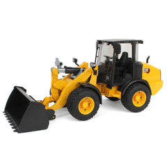 Bruder 02486 Cat Wheel Loader front shovel detachable for realistic play and easy dumping.